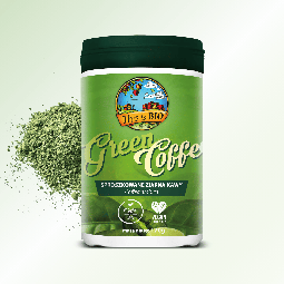 Ekologiczna Młoda Zielona Kawa This is BIO 170g w słoiku obok porcji zielonego proszku.